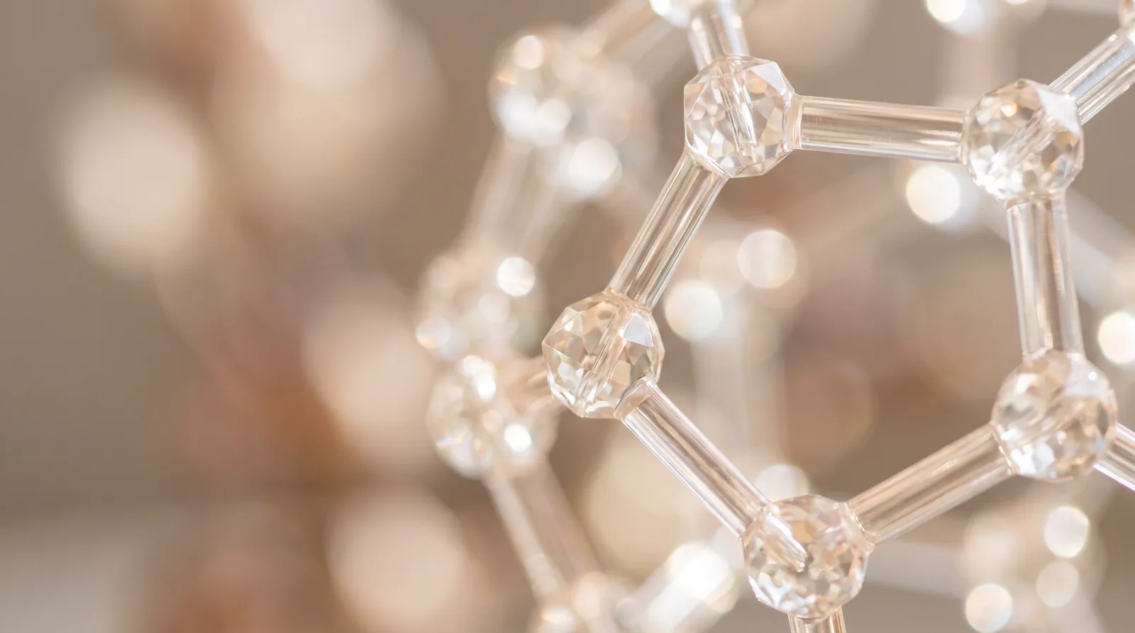Champagne-gold light refracting through a clear crystal lattice